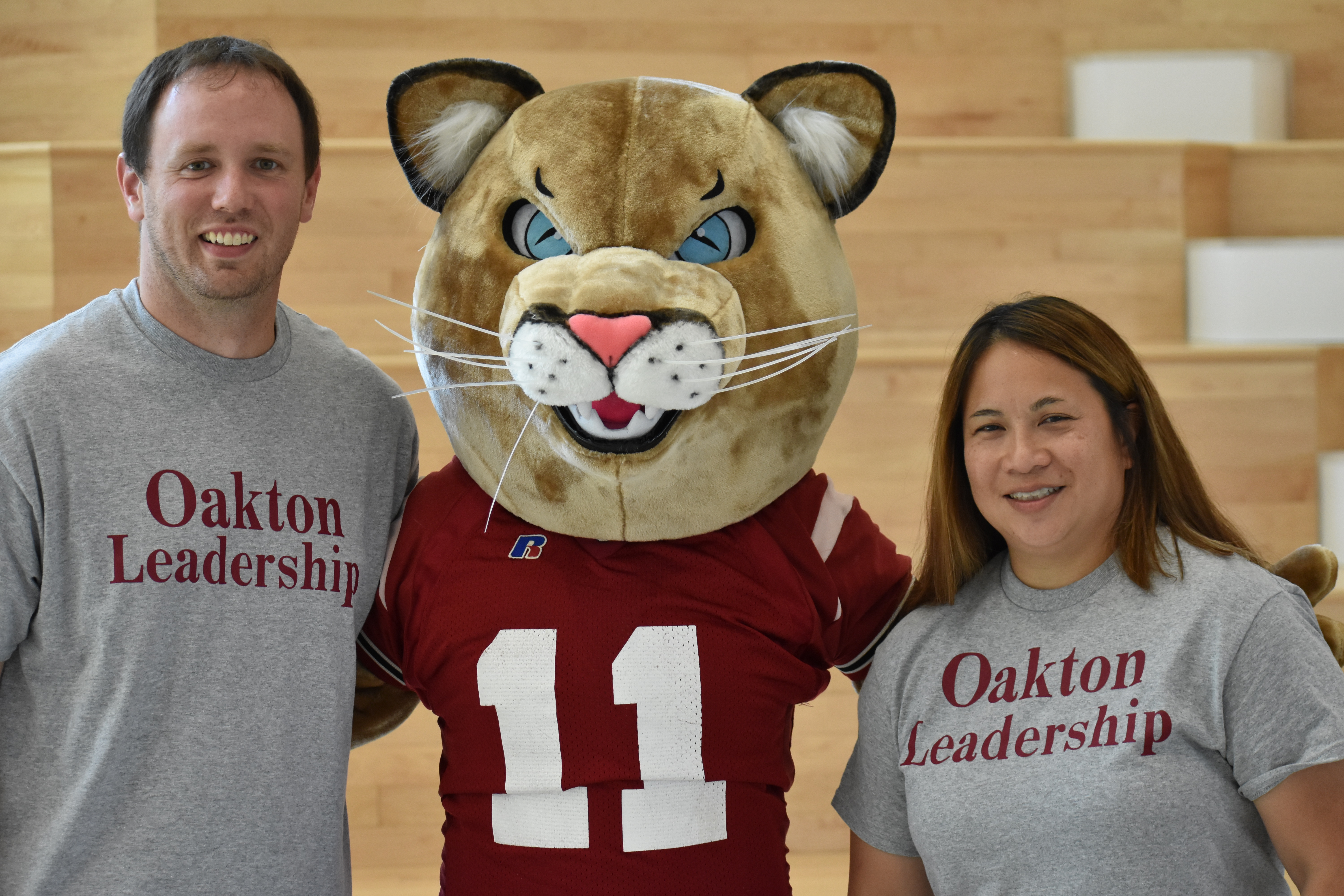 image of Mr. McCulla and Ms. Butterfield with the Cougar Mascot